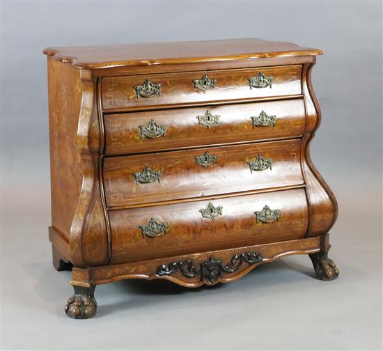 A 19th century Dutch walnut and marquetry bombe commode, W.3ft 6in. D.1ft 10in. H.2ft 9in.